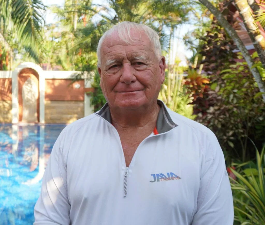 John Coffin from Java Yachting wearing a white Java branded sailing shirt