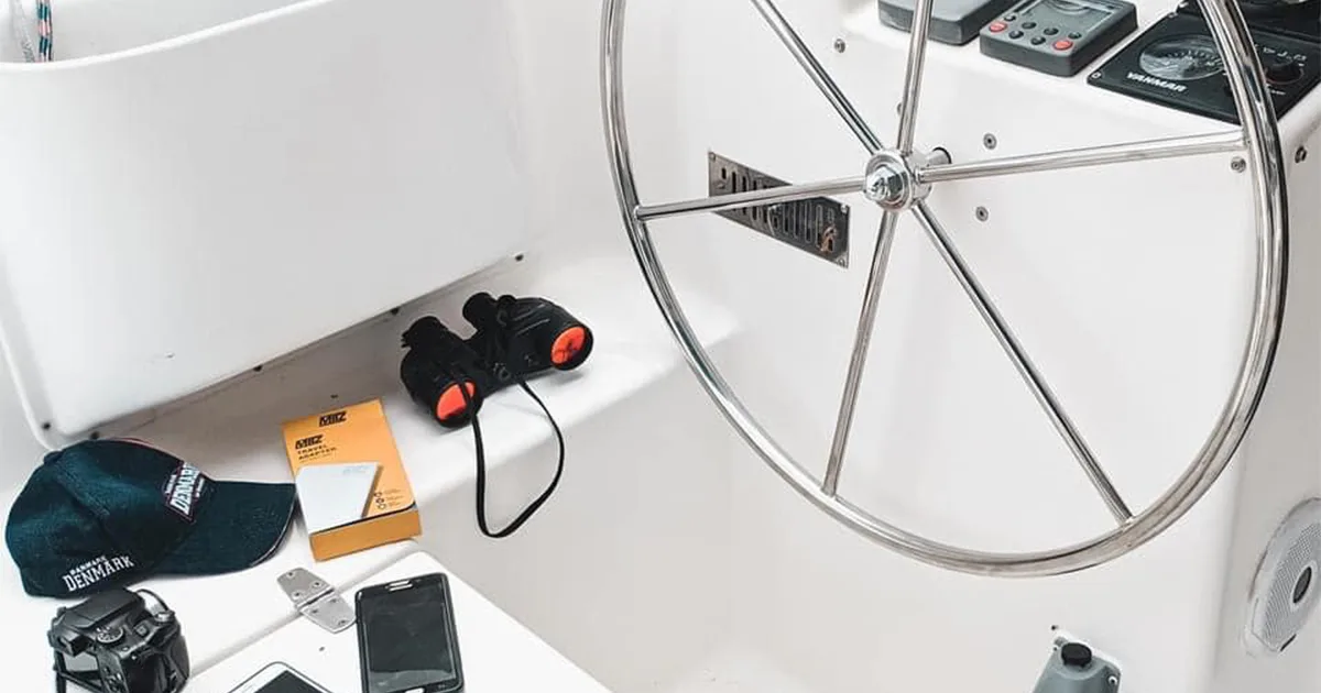 Yacht helm and navigation equipment used during practical Java Yachting sailing training in Thailand